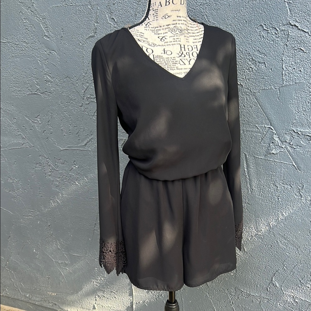 Stylish Black Romper with Lace Detail